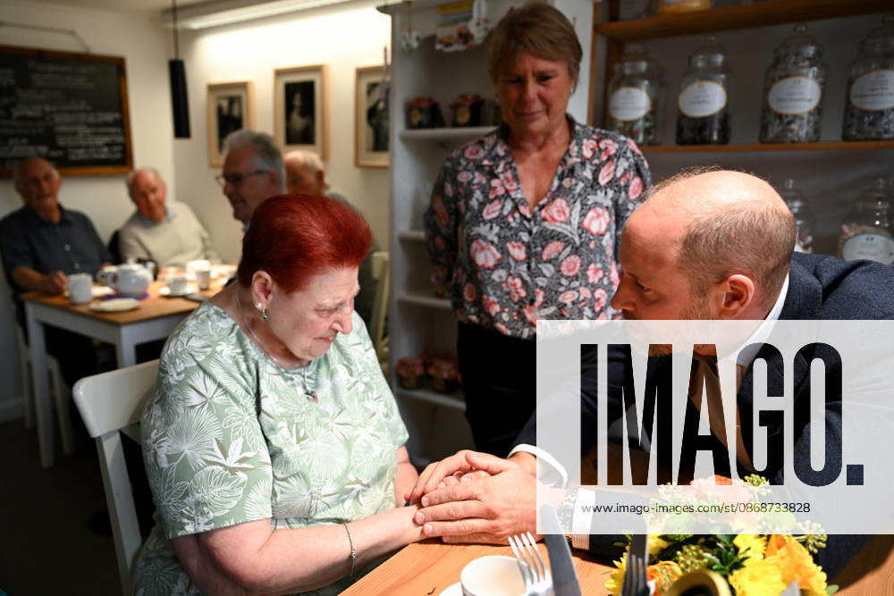 The Prince Of Wales Visits Ilminster ILMINSTER, ENGLAND - OCTOBER 06: Prince William, Prince of Wales speaks with Tina Groves, a local business owner during his visit to Sweet Surprise cafe on October 06, 2026 in Ilminster, England. The Prince of Wales visited Ilminster in Somerset to learn about communities growing their resilience to wild fires, flood and challenges caused by extreme weather and global warming., Credit:Finnbarr Webster PA ROTA - B68 Avalon United Kingdom, England, Ilminster