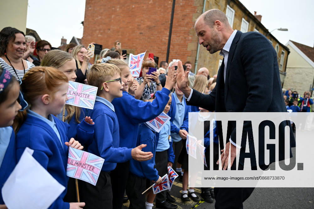 The Prince Of Wales Visits Ilminster ILMINSTER, ENGLAND - OCTOBER 06: Prince William, Prince of Wales, high-fives members from the local school during his visit to Sweet Surprise cafe on October 06, 2026 in Ilminster, England. The Prince of Wales visited Ilminster in Somerset to learn about communities growing their resilience to wild fires, flood and challenges caused by extreme weather and global warming., Credit:Finnbarr Webster PA ROTA - B68 Avalon United Kingdom, England, Ilminster