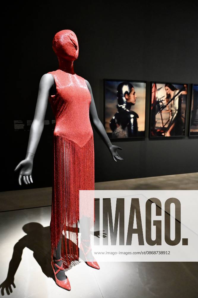 Tate Britain, The 90s : Art and Fashion London, UK. Red Dress by Alexander McQueen. Art & Fashion, Tate Britain. Tate Britain has opened the first exhibition to explore the art, photography and fashion of the 1990s, adecade synonymous with possibility, optimism and an audacious spirit. The 90s : Art and Fashion explores this period s surge of creative energy, shaped by its opportunities and challenges. 06 October 2026., Credit:Michael Melia Michael Melia - B2778 Avalon