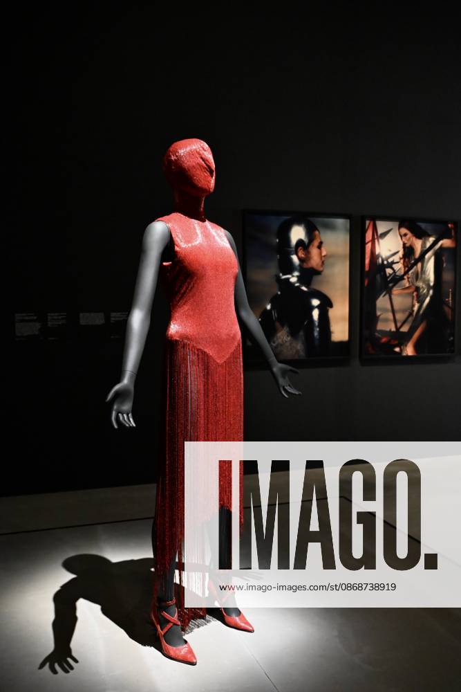Tate Britain, The 90s : Art and Fashion London, UK. Red Dress by Alexander McQueen. Art & Fashion, Tate Britain. Tate Britain has opened the first exhibition to explore the art, photography and fashion of the 1990s, adecade synonymous with possibility, optimism and an audacious spirit. The 90s : Art and Fashion explores this period s surge of creative energy, shaped by its opportunities and challenges. 06 October 2026., Credit:Michael Melia Michael Melia - B2778 Avalon