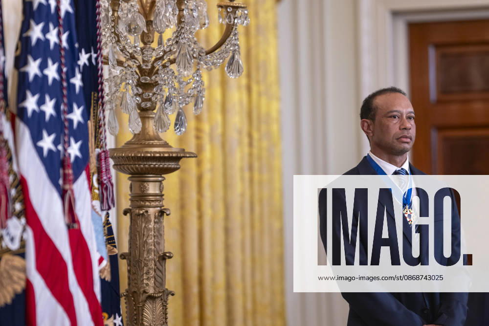 U.S President Donald Trump, left, welcomes golf legend Tiger Woods for Black History Month at the East Room of the White House, February 20, 2025 in Washington, D.C. Washington United States - ZUMAp138 20261006_zaa_p138_010