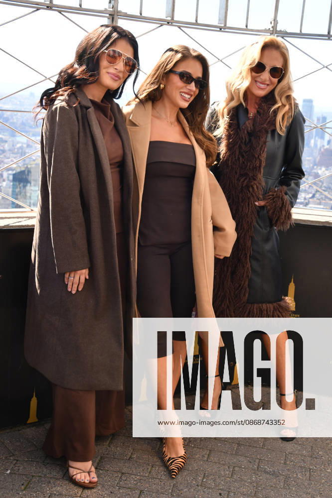NEW YORK, NY- OCTOBER 6: Sydney Rae Bass, Jessie James Decker and Karen Parker at the Empire State Building to Celebrate the Release of New Cookbook The Secret Sauce: A Family Cookbook Seasoned with Love on October 6, 2026 in New York City.