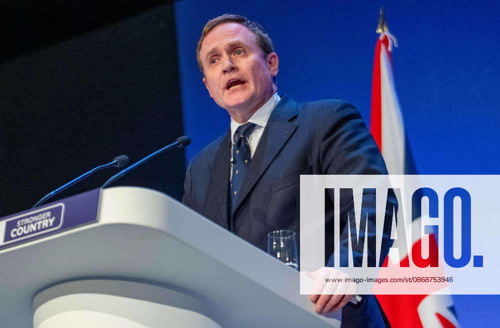 Tom Tugendhat MBE Shadow Foreign Secretary addresses audience. The session Defending Britain in a More Dangerous World took place on the main stage at the Conservative Party Conference at the ICC Birmingham. It featured key shadow cabinet figures including Tom Tugendhat, Helen Whately , James Cartlidge, and Alex Burghart , as well as a performance by St Mary s Ukrainian School choir. They were also joined by Yehor Cherniev, Ukrainian MP and Professor Niall Ferguson Birmingham United Kingdom - ZUMAs197 20261006_aaa_s197_105