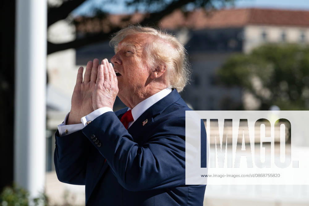 President DONALD TRUMP shouts up to visitors on the South Portico of the White House before departing aboard Marine One for Baltimore, Maryland. Washington United States - ZUMAk206 20261006_znp_k206_018