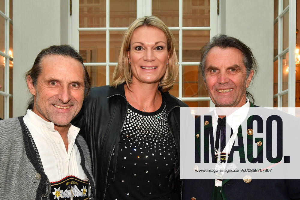 Alexander Huber, Maria Riesch, and Thomas Huber (the Huber brothers) at the presentation of the Bavarian State Medal for Social Merit at the All Saints Court Church (Allerheiligen Hofkirche) in the Residenz on October 6, 2026, in Munich,