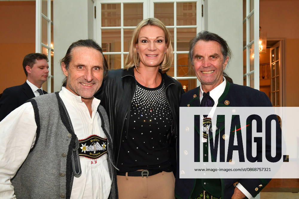 Alexander Huber, Maria Riesch, and Thomas Huber (the Huber brothers) at the presentation of the Bavarian State Medal for Social Merit at the All Saints Court Church (Allerheiligen Hofkirche) in the Residenz on October 6, 2026, in Munich,