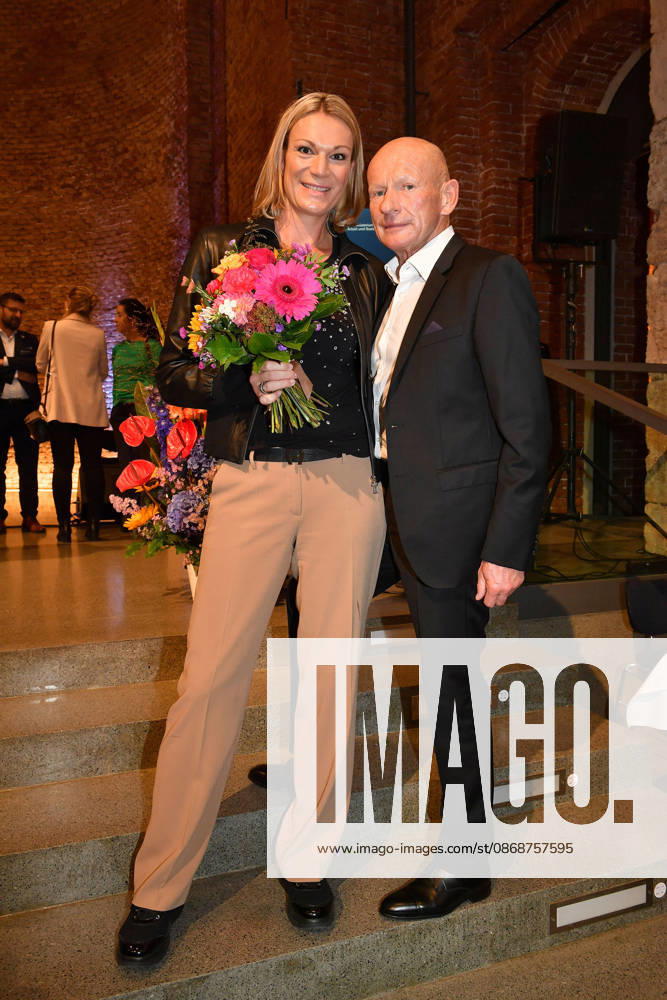 Maria Höfl Riesch and Johann Schrempf at the presentation of the Bavarian State Medal for Social Merit at the All Saints Court Church, Residenz on October 6, 2026, in Munich. Maria Riesch and Johann Schrempf attend the presentation of the Bavarian State Medal for Social Mer