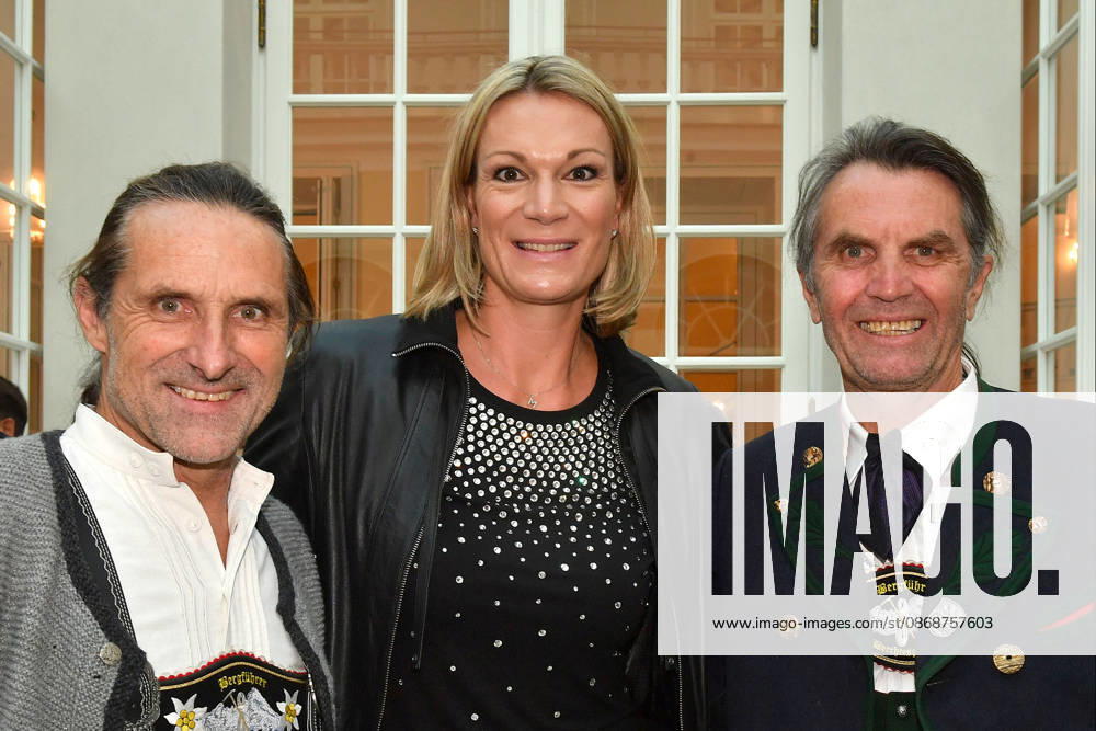 Alexander Huber, Maria Riesch, and Thomas Huber (the Huber brothers) at the presentation of the Bavarian State Medal for Social Merit at the All Saints Court Church (Allerheiligen Hofkirche) in the Residenz on October 6, 2026, in Munich,
