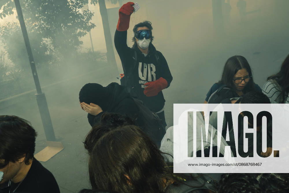 Paris Students Protest Education Conditions A masked demonstrator raises a fist above a crowd surrounded by smoke in Paris, France, on October 6, 2026. France s Interior Ministry said 256,000 people marched nationwide, including 56,000 in Paris, during the student-led day of action over school conditions. High school students called for more education funding and staff, smaller classes and improved facilities, with teachers, parents and unions joining demonstrations. Paris Ile de France France