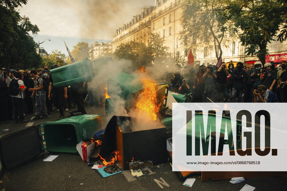 Paris Students Protest Education Conditions Demonstrators stand around a burning barricade made from street furniture and bins in Paris, France, on October 6, 2026. France s Interior Ministry said 256,000 people marched nationwide, including 56,000 in Paris, during the student-led day of action over school conditions. High school students called for more education funding and staff, smaller classes and improved facilities, with teachers, parents and unions joining demonstrations. Paris Ile de France France
