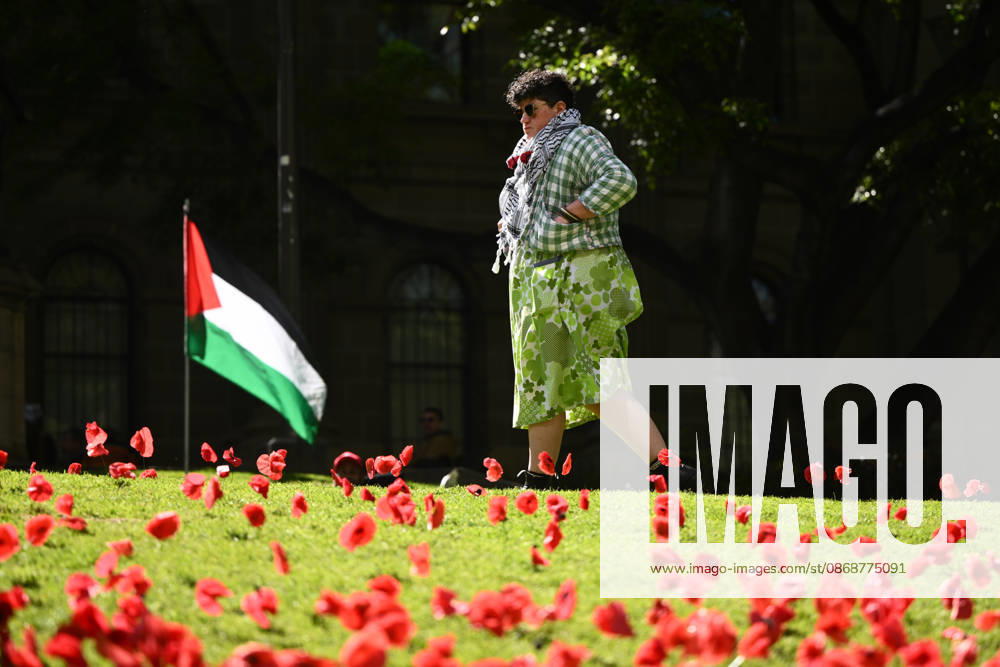 PRO-PALESTINE VIGIL, Pro-Palestine protestors hold a vigil for Gaza at the State Library Victoria in Melbourne, Wednesday, October 7, 2026. ( NO ARCHIVING MELBOURNE VICTORIA Australia