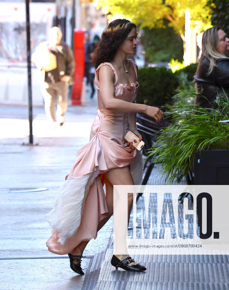 Rosalia Leaves Her Hotel - NYC Spanish Singer Rosalia with a nice pink dress leaves her hotel in New York on October 6, 2026. Photp by Dylan Travis ABACAPRESS.COM New York City NY United States