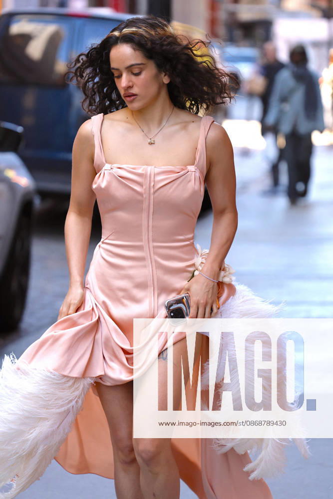 Rosalia Leaves Her Hotel - NYC Spanish Singer Rosalia with a nice pink dress leaves her hotel in New York on October 6, 2026. Photp by Dylan Travis ABACAPRESS.COM New York City NY United States