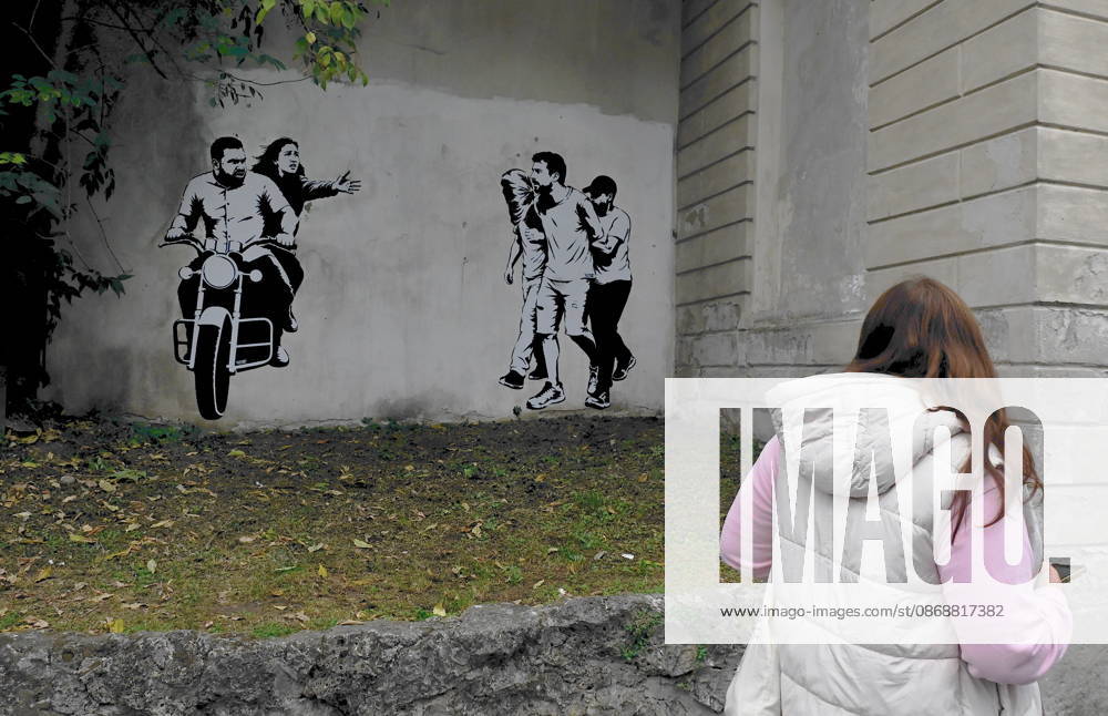 IPA89393689 - MILAN - October 7, 2026 - A mural by Alexandro Palombo, an artwork on display on October 7 at the Museum of Modern Art, located at 16 Via Palestro, dedicated to the young couple kidnapped during the attack on the Nova Music Festival