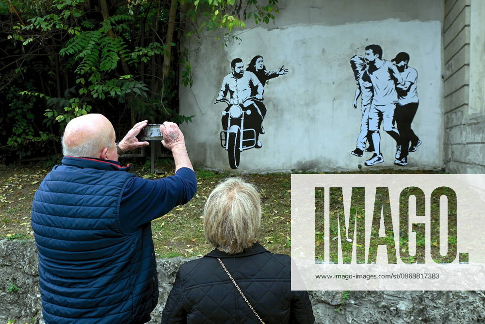 IPA89393690 - MILAN - October 7, 2026 - A mural by Alexandro Palombo, an artwork on display on October 7 at the Museum of Modern Art, located at 16 Via Palestro, dedicated to the young couple kidnapped during the attack on the Nova Music Festival