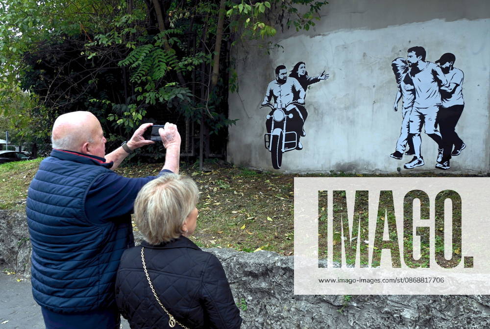 IPA89393692 - MILAN - October 7, 2026 - A mural by Alexandro Palombo, an artwork on display on October 7 at the Museum of Modern Art, located at 16 Via Palestro, dedicated to the young couple kidnapped during the attack on the Nova Music Festival