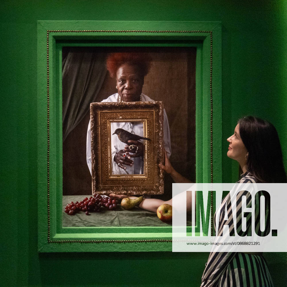 Tim Walker s Fairyland: Love and Legends Photo Call at National Portrait Gallery, London, UK - 7 October 2026 A staff member views Olivette Cole-Wilson, and blackbird by Tim Walker as part of The National Portrait Gallery s Tim Walker s Fairyland: Love and Legends Exhibition which runs from 9th October 2026 - 7th February 2027 at National Portrait Gallery in London, England, UK on Wednesday 7 October, 2026., Credit:Justin Ng Avalon UK, England, London, National Portrait Gallery