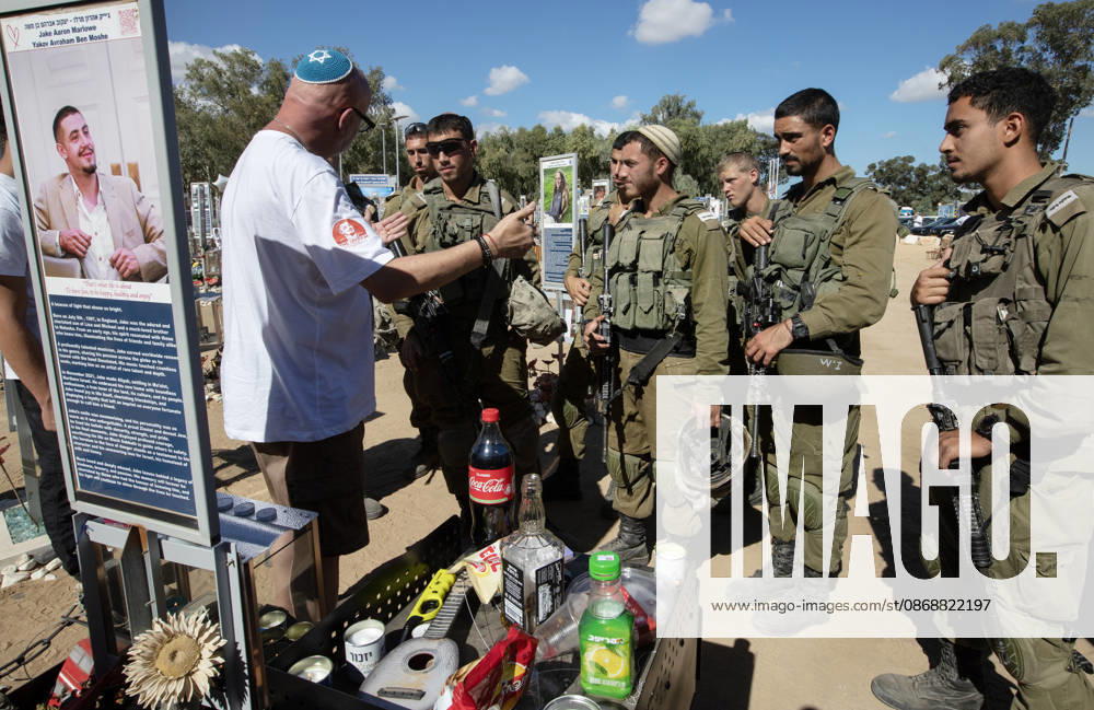 The father of Jake Marlowe, born in the UK in 1997 and immigrated to Israel in 2021, speaks to a group of Israeli combat soldiers and thanks them for their service in the Re im memorial on the third anniversary where Hamas massacred 364 people and took another 40 hostage during the Nova dance party on October 7, 2023, near Kibbutz Re im, southern Israel on Wednesday, October 7, 2026. The Hamas cross-border attacks resulted in the deaths of approximately 1,200 people and the abduction of 251 hostages. ISR2026060800299 JimxHollander