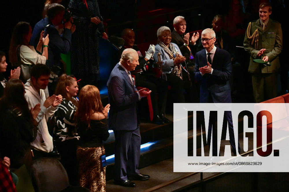 Britain s King Charles III applauds along side Apple Ceo Tim cook (R) during a music workshop for young people, the first as part of the Apple x Kings Trust Creative Labs, at Battersea Power Station in south west London on October 7, 2026., Credit:BEN STANSALL PA ROTA - B68 Avalon United Kingdom, London