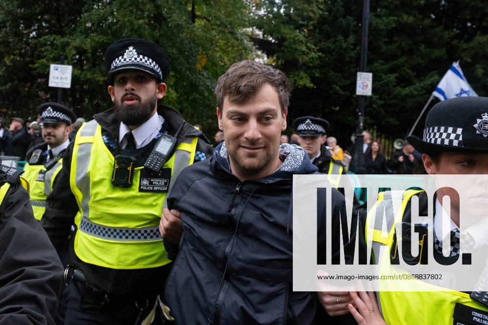 Pro-Palestinian protesters march In London LONDON, UNITED KINGDOM - OCTOBER 7: Police officers detain a Pro-Palestinian demonstrator during a protest in central London, United Kingdom, on October 7, 2026, marking the third anniversary of the October 7, 2023 attacks. Thomas Krych Anadolu London United Kingdom. Editorial use only. Please get in touch for any other usage.
