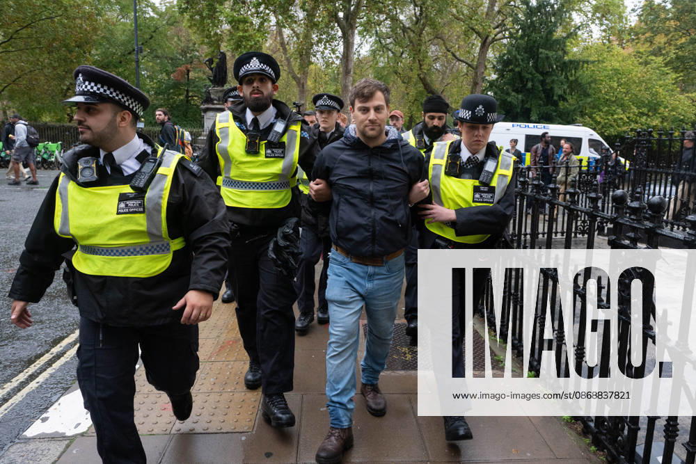 Pro-Palestinian protesters march In London LONDON, UNITED KINGDOM - OCTOBER 7: Police officers detain a Pro-Palestinian demonstrator during a protest in central London, United Kingdom, on October 7, 2026, marking the third anniversary of the October 7, 2023 attacks. Thomas Krych Anadolu London United Kingdom. Editorial use only. Please get in touch for any other usage.