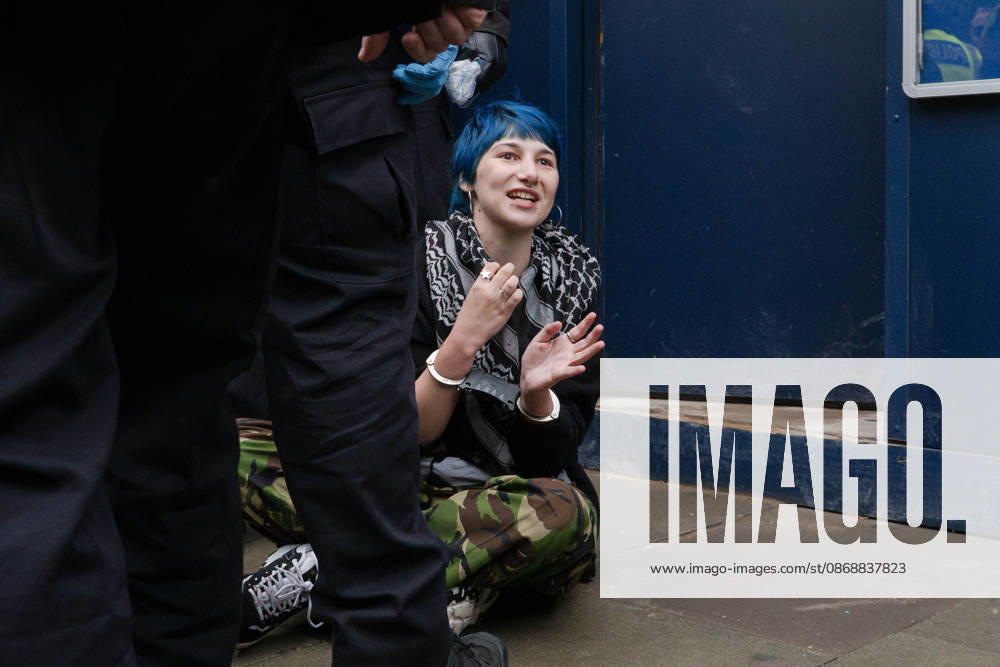 Pro-Palestinian protesters march In London LONDON, UNITED KINGDOM - OCTOBER 7: Police officers detain a Pro-Palestinian demonstrator during a protest in central London, United Kingdom, on October 7, 2026, marking the third anniversary of the October 7, 2023 attacks. Thomas Krych Anadolu London United Kingdom. Editorial use only. Please get in touch for any other usage.