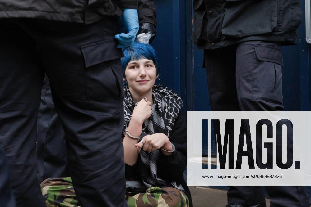 Pro-Palestinian protesters march In London LONDON, UNITED KINGDOM - OCTOBER 7: Police officers detain a Pro-Palestinian demonstrator during a protest in central London, United Kingdom, on October 7, 2026, marking the third anniversary of the October 7, 2023 attacks. Thomas Krych Anadolu London United Kingdom. Editorial use only. Please get in touch for any other usage.