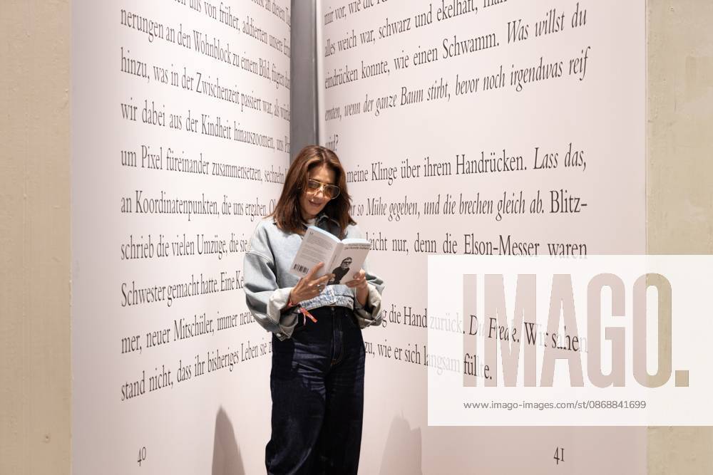 78th Frankfurt Book Fair: A visitor to the Frankfurt Book Fair reads a book inside a giant model of a book. The 78th Frankfurt Book Fair will take place October 7–11, 2026, at the Frankfurt am Main Exhibition Center in Hesse, Germany. 2026-10-07_frankfurter-buchmesse_15