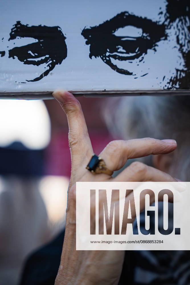 A sign depicting Netanyahu is held up by a demonstrator at the beach in protest against the Israeli government on the third anniversary of October 7th. Tel Aviv Israel - ZUMAg280 20261007_znp_g280_003