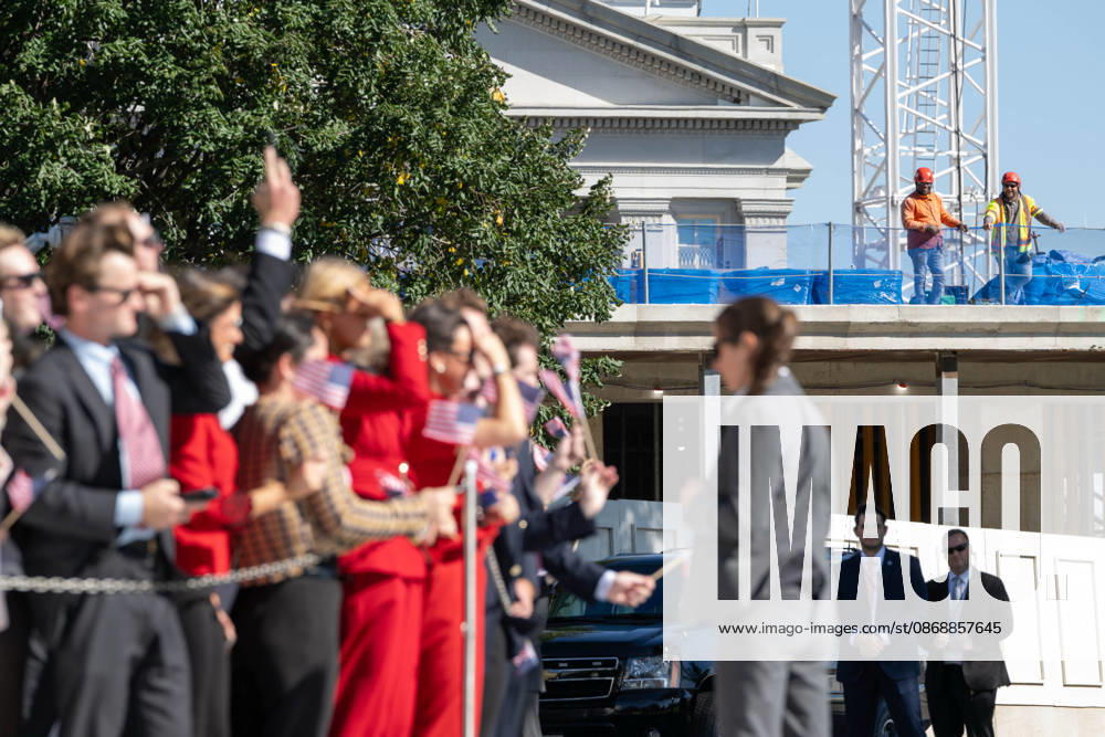 Visitors and construction workers watch as Marine One departs the White House with President DONALD TRUMP aboard en route to San Antonio, Texas, where he is scheduled to headline a midterm campaign rally. Washington United States - ZUMAk206 20261007_znp_k206_008