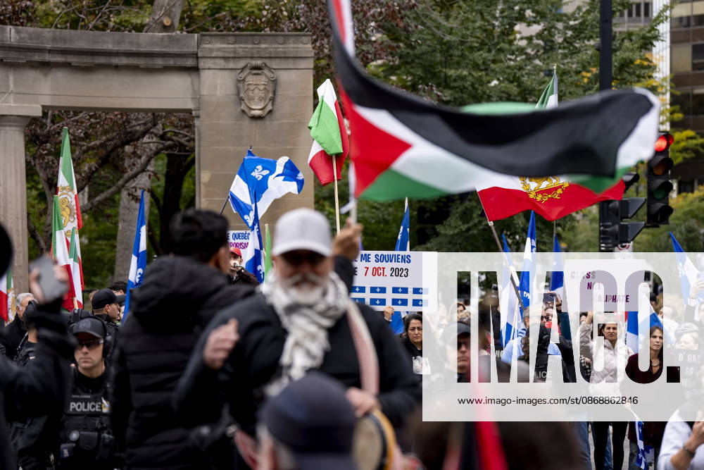 Pro-Palestinian and pro-Israel demonstrators are separated by police in Montreal, on Wednesday, Oct. 7, 2026. Montreal CANADA - ZUMAc35_ 20261007_zaf_c35_068