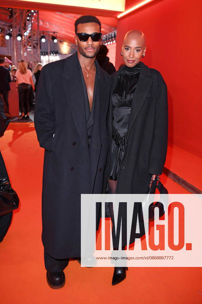 Tijan Njie and Sharon Battiste at the ABOUT YOU OPERA FASHION SHOW at the Admiralspalast in Berlin on October 7, 2026
