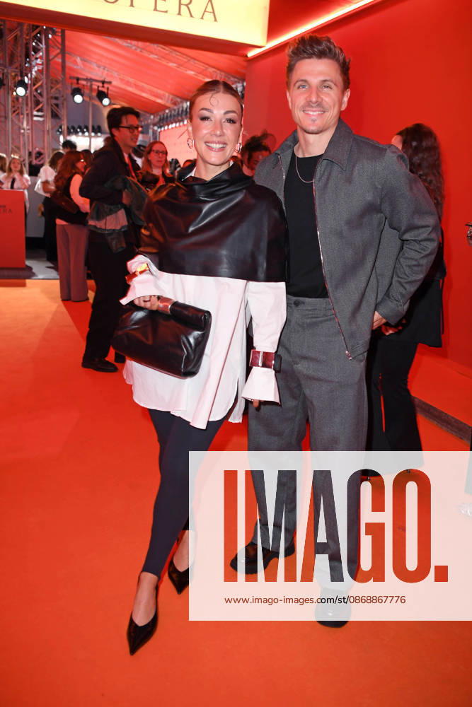 Chris Krömer with his girlfriend Sabrina Nickel at the ABOUT YOU OPERA FASHION SHOW at the Admiralspalast in Berlin on October 7, 2026
