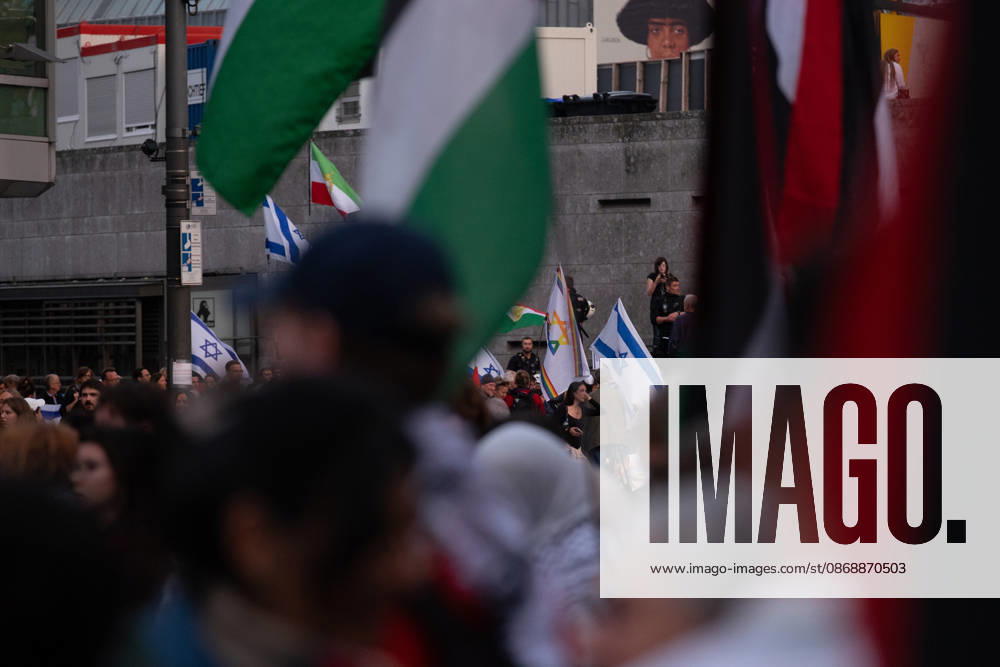 Multiple hundreds of people took part in a demonstration in Cologne marking the third anniversary of October 7, 2023, protesting Israelâ€⠢s military campaign and genocidal intervention in Gaza. A smaller counter-protest took place without reported confrontations between the two groups...Police intervened and stopped the demonstration multiple times before protesters were held inside a police cage for approximately two hours. Officers later opened a corridor and allowed them to leave in small groups. During the dispersal, police arrested around 10 protesters, who were later released from custody. Cologne Germany - ZUMAm356 20261007_zip_m356_008