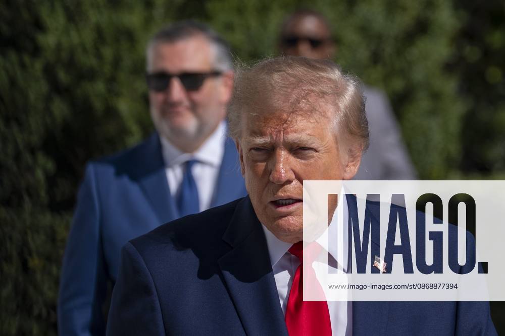 Trump Departs White House in Washington, USA - 7 Oct 26 Sen. Ted Cruz stands behind President Donald Trump as he speaks to the media before departing on Marine One from the South Lawn of the White House. Trump was enroute to a campaign event in San Antonio, Texas. Washington United States