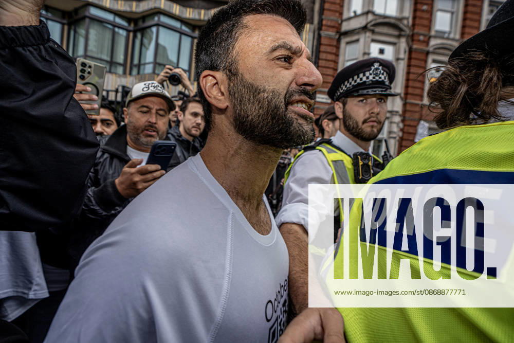 Pro-Israeil counter protestors challenge pro-Palestine demonstrators in London, UK - 7 OCT 2026. A protester seen chanting slogans behind the police cordon separating pro-Israeli counter-protestors from pro-Palestine demonstrators in central London on the 3rd anniversary of Hamas attack. Pro-Palestine activists from Central London Universities chose the 3rd anniversary of the October 7th attack by Hamas to protest against Israel’s war on Gaza. They clashed en route with pro-Israeli counter protestors. The demonstration was arranged by an inter-uni coalition that includes King’s College and LSE. London United Kingdom