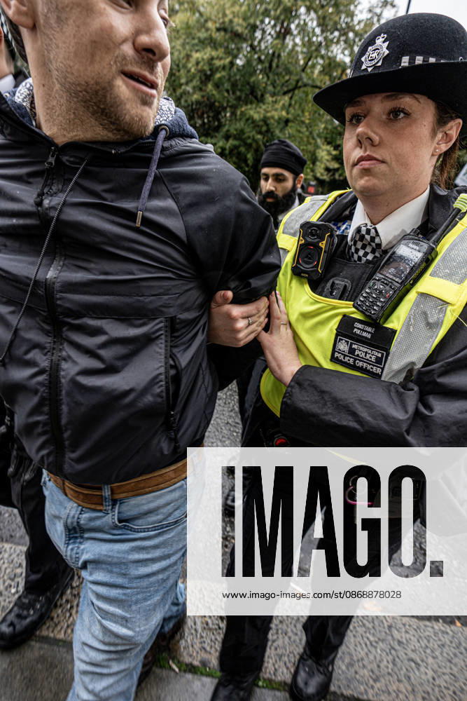 Pro-Israeil counter protestors challenge pro-Palestine demonstrators in London, UK - 7 OCT 2026. A pro-Israeli counter-protestor is arrested for breaching the peace and not maintaining sufficient distance from pro-Palestine demonstrators. Pro-Palestine activists from Central London Universities chose the 3rd anniversary of the October 7th attack by Hamas to protest against Israel’s war on Gaza. They clashed en route with pro-Israeli counter protestors. The demonstration was arranged by an inter-uni coalition that includes King’s College and LSE. London United Kingdom