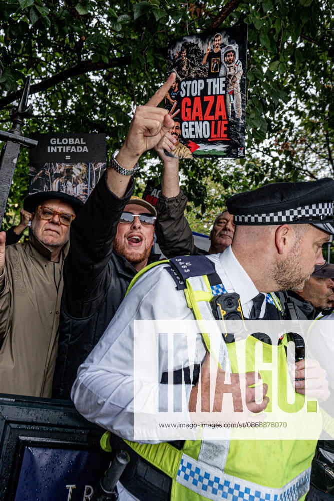 Pro-Israeil counter protestors challenge pro-Palestine demonstrators in London, UK - 7 OCT 2026. Protesters seen chanting slogans while holding placards behind the police man during the protest against Israel’s war on Gaza. Pro-Palestine activists from Central London Universities chose the 3rd anniversary of the October 7th attack by Hamas to protest against Israel’s war on Gaza. They clashed en route with pro-Israeli counter protestors. The demonstration was arranged by an inter-uni coalition that includes King’s College and LSE. London United Kingdom