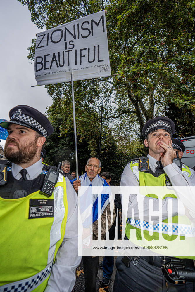 Pro-Israeil counter protestors challenge pro-Palestine demonstrators in London, UK - 7 OCT 2026. A police cordon separates pro-Israeli counter-protestors from pro-Palestine demonstrators on the 3rd anniversary of Hamas attack. Pro-Palestine activists from Central London Universities chose the 3rd anniversary of the October 7th attack by Hamas to protest against Israel’s war on Gaza. They clashed en route with pro-Israeli counter protestors. The demonstration was arranged by an inter-uni coalition that includes King’s College and LSE. London United Kingdom