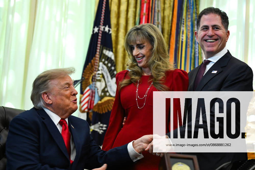 WASHINGTON, DC - OCT. 7: United States President Donald J Trump shakes hands with Michael S Dell, founder, chairman, and CEO of Dell Technologies during an announcement on Trump Accounts in the Oval Office of the White House in Washington, DC, USA, on Wednesday, October 7, 2026. Looking on from center is Susan Dell, wife of Dell Technologies CEO Michael Dell.