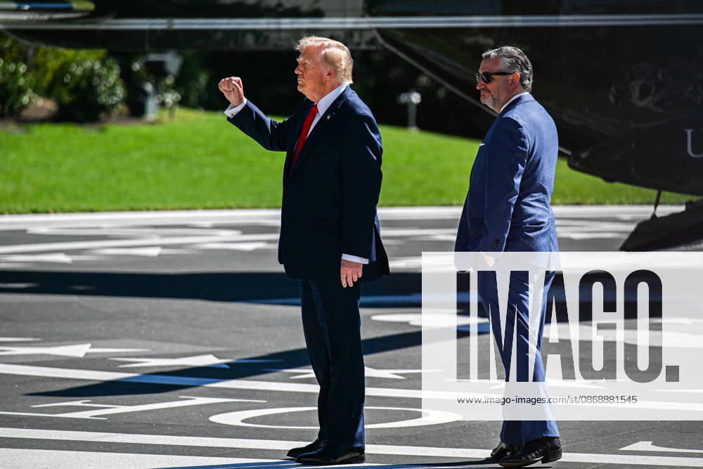 WASHINGTON, DC - OCT. 7: United States President Donald J Trump pumps his fist to people at a rope line as he and US Senator Ted Cruz (Republican of Texas) prepare to depart the South Lawn of the White House in Washington, DC, USA, en route to a campaign rally in San Antonio, Texas on Wednesday
