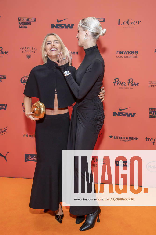 ABB ABOUTYOU Caroline Daur and Lena Gercke as guests on the orange carpet at the ABOUT YOU Opera Fashion Show at the Admiralspalast on October 7, 2026, in Berlin, Germany