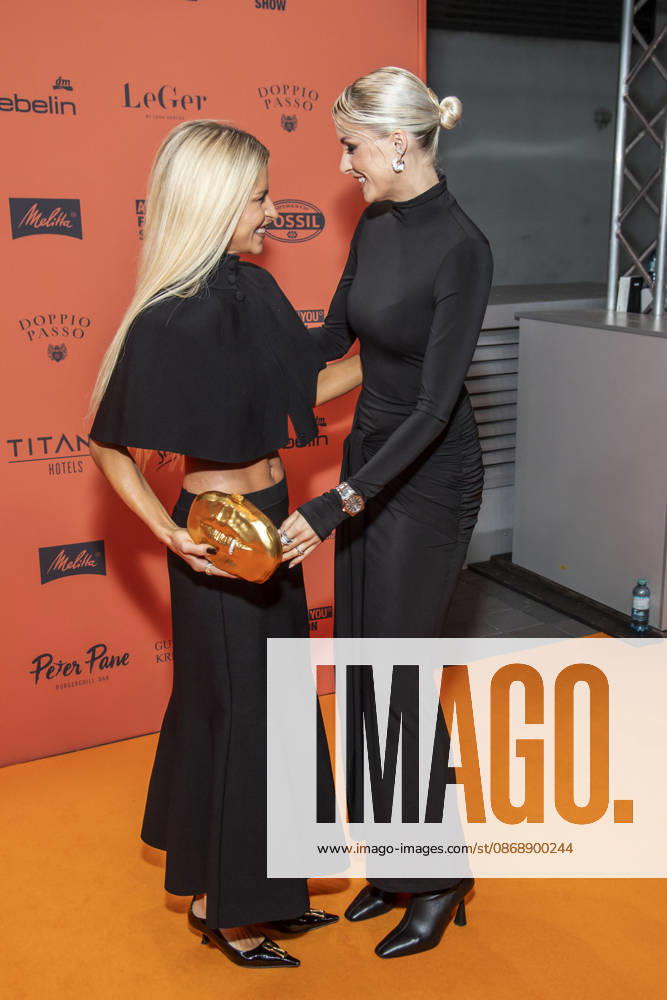 ABB ABOUTYOU Caroline Daur and Lena Gercke as guests on the orange carpet at the ABOUT YOU Opera Fashion Show at the Admiralspalast on October 7, 2026, in Berlin, Germany
