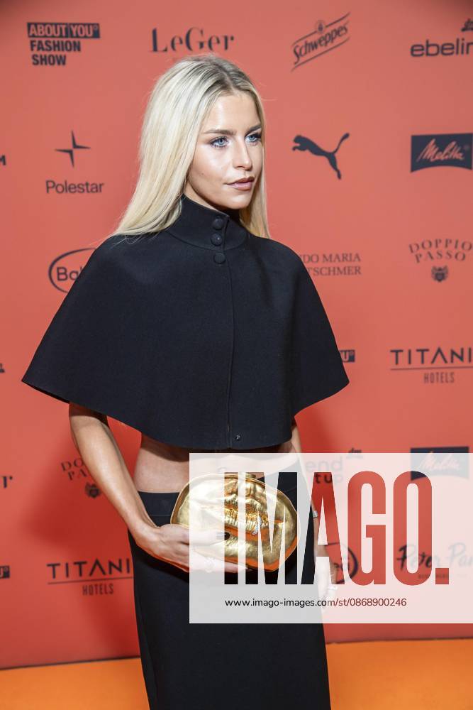 ABB ABOUTYOU Caroline Daur as a guest on the orange carpet at the ABOUT YOU Opera Fashion Show at the Admiralspalast on October 7, 2026, in Berlin, Germany