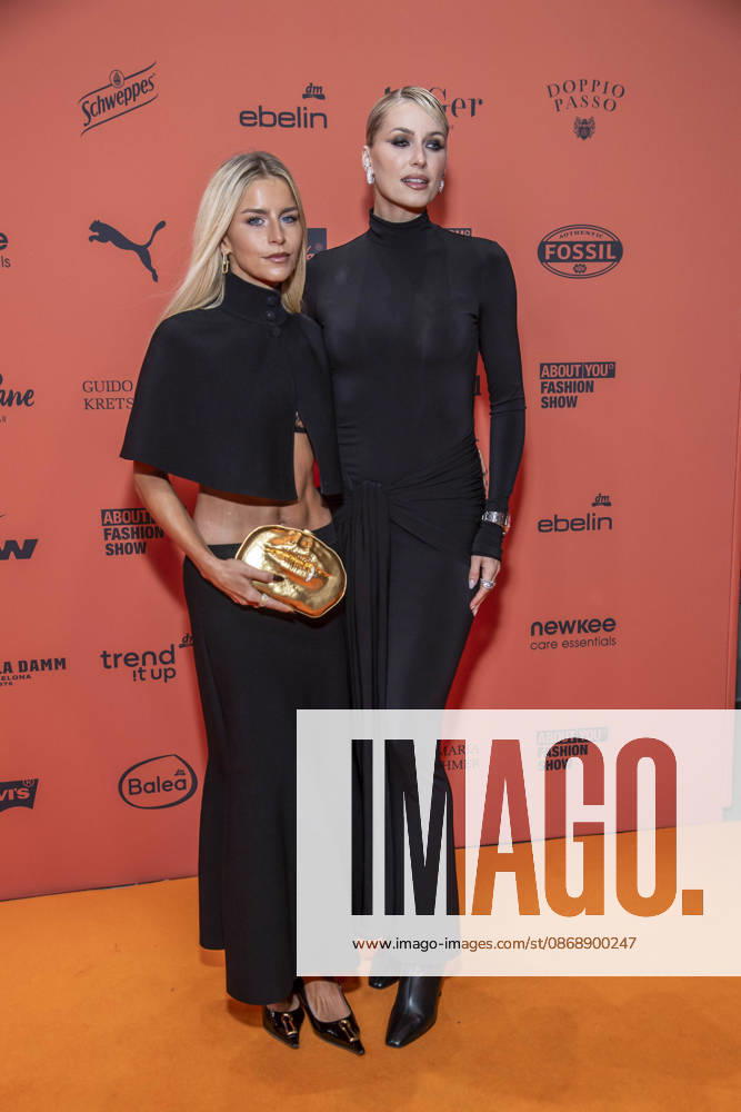 ABB ABOUTYOU Caroline Daur and Lena Gercke as guests on the orange carpet at the ABOUT YOU Opera Fashion Show at the Admiralspalast on October 7, 2026, in Berlin, Germany