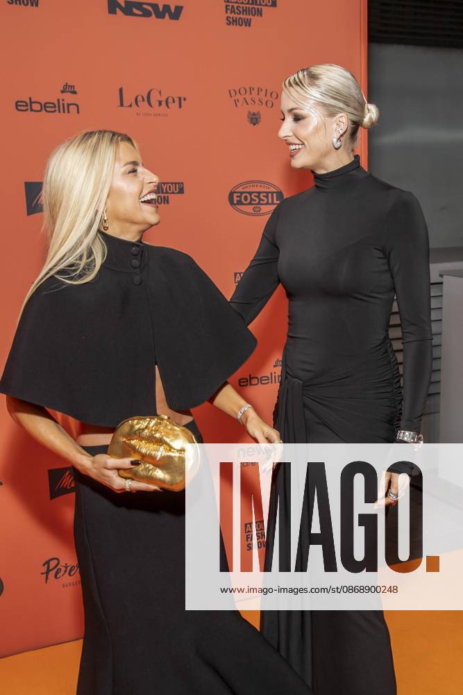 ABB ABOUTYOU Caroline Daur and Lena Gercke as guests on the orange carpet at the ABOUT YOU Opera Fashion Show at the Admiralspalast on October 7, 2026, in Berlin, Germany