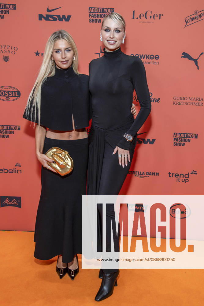 ABB ABOUTYOU Caroline Daur and Lena Gercke as guests on the orange carpet at the ABOUT YOU Opera Fashion Show at the Admiralspalast on October 7, 2026, in Berlin, Germany