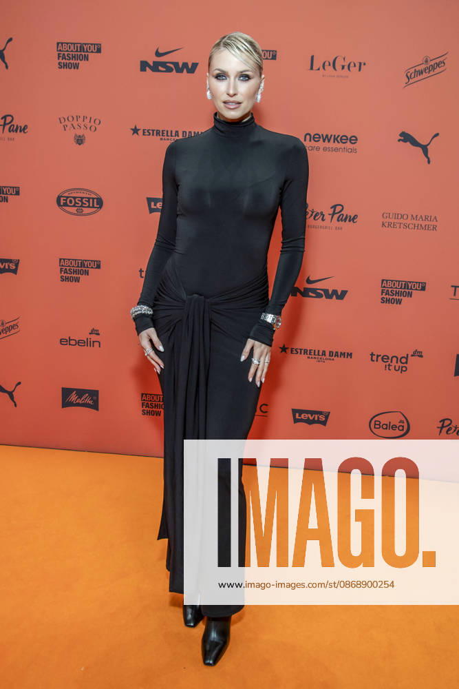 ABB ABOUTYOU Lena Gercke as a guest on the orange carpet at the ABOUT YOU Opera Fashion Show at the Admiralspalast on October 7, 2026, in Berlin, Germany
