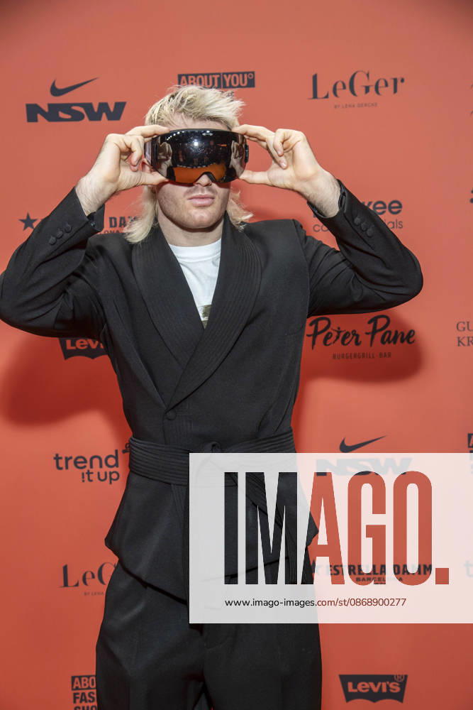 ABB ABOUTYOU Ski Aggu as a guest on the orange carpet at the ABOUT YOU Opera Fashion Show at the Admiralspalast on October 7, 2026, in Berlin, Germany
