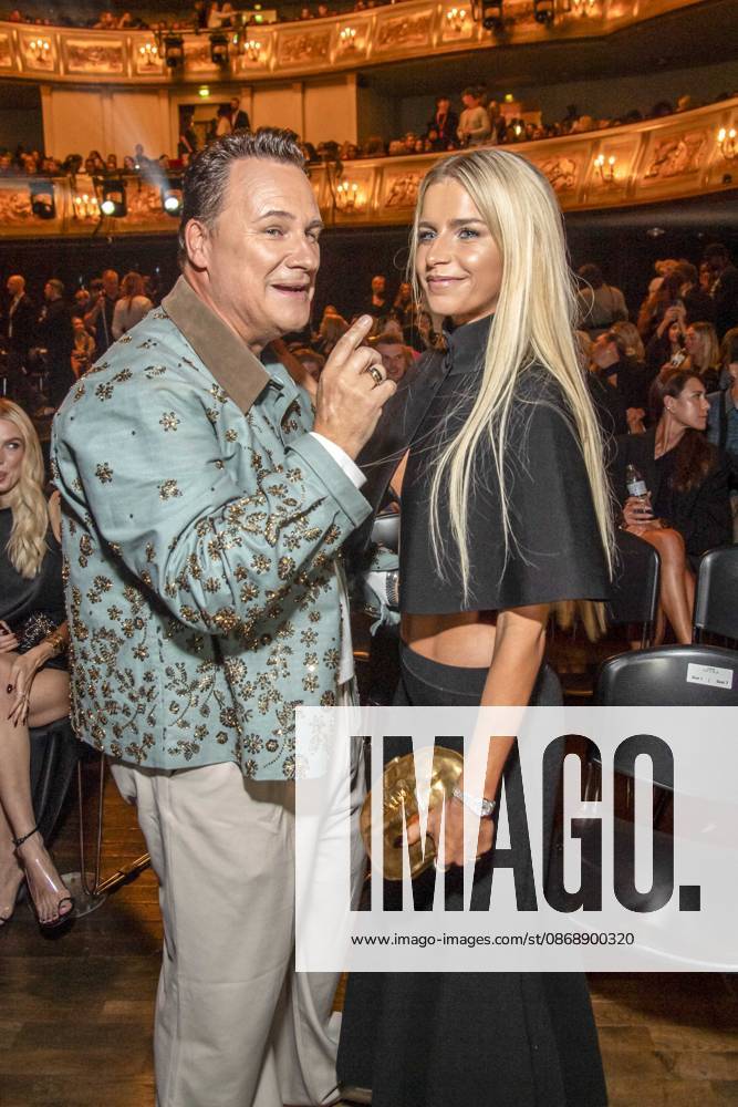 ABB ABOUTYOU Guido Maria Kretschmer and Caroline Daur attend the ABOUT YOU Opera Fashion Show at the Admiralspalast on October 7, 2026, in Berlin, Germany
